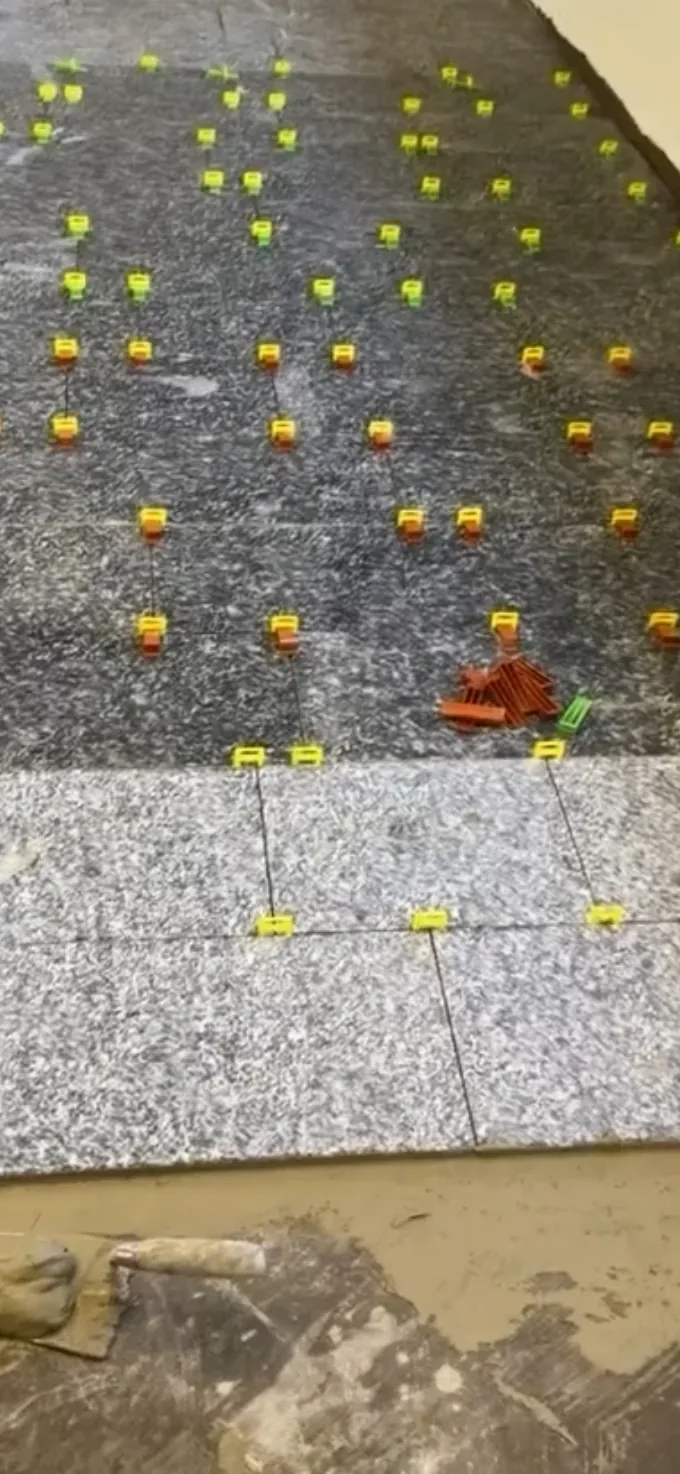 Pose de carrelage avec système de nivellement